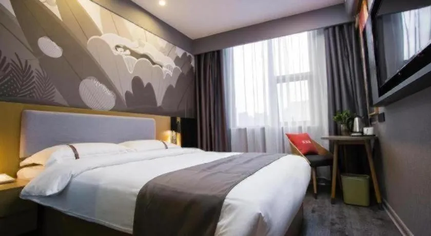 Bed in Thank Inn Hotel Guangxi Hechi Yizhou Sankeshu