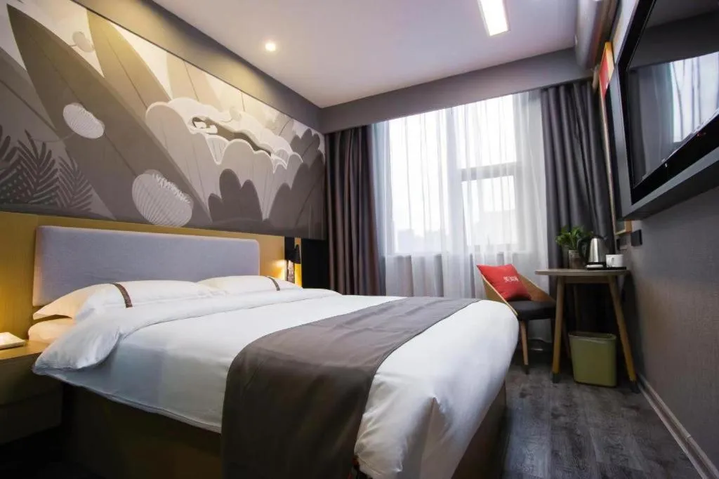 Bed in Thank Inn Hotel Guangxi Hechi Yizhou Sankeshu