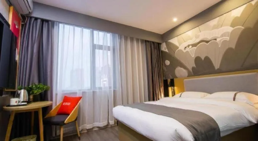 Bed in Thank Inn Hotel Guangxi Hechi Yizhou Sankeshu