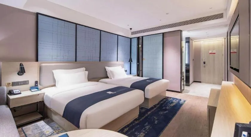 Bed in Echarm Hotel Nanning Wuming
