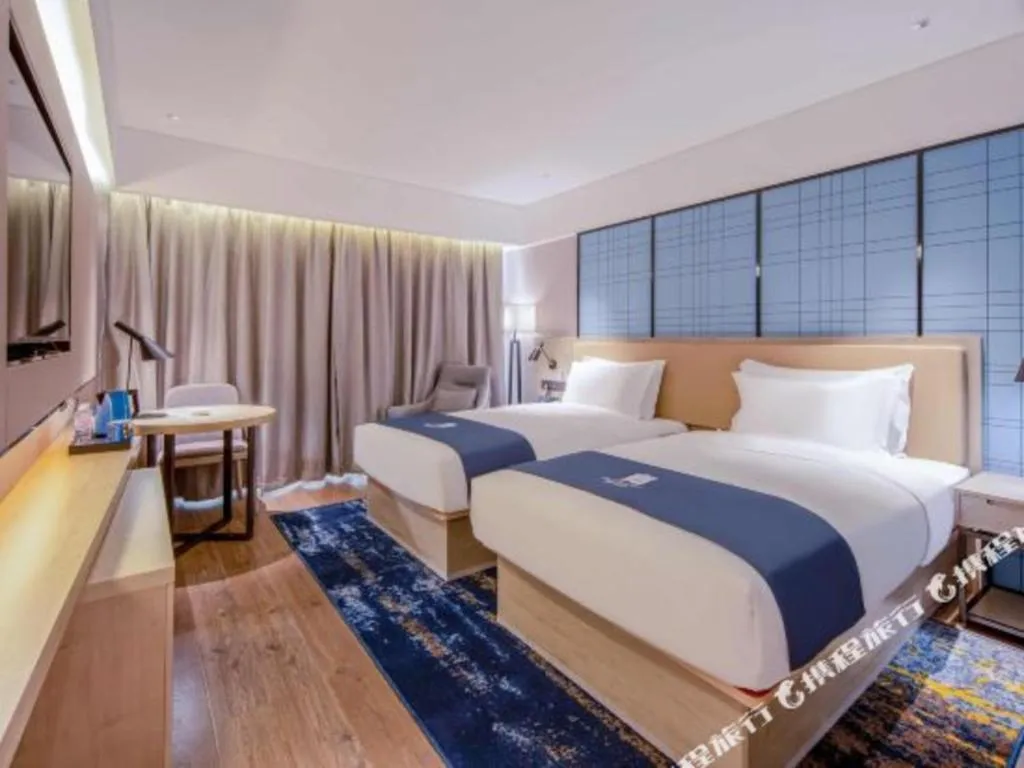 Bed in Echarm Hotel Nanning Wuming