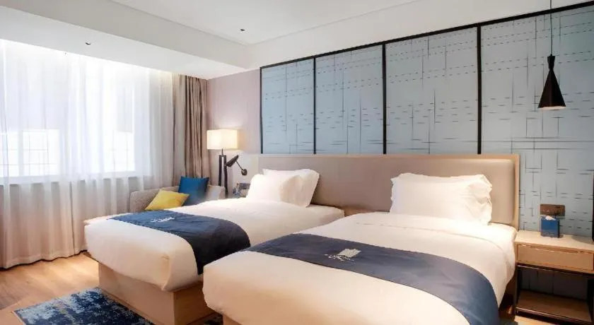 Bed in Echarm Hotel Nanning Wuming