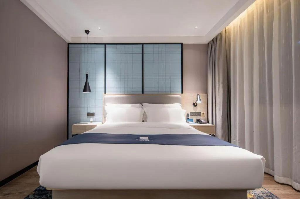 Bed in Echarm Hotel Nanning Wuming