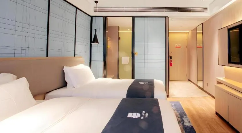 Bed in Echarm Hotel Nanning Wuming