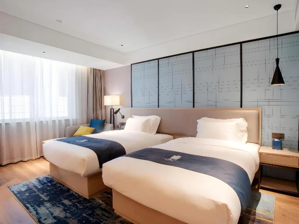 Bed in Echarm Hotel Nanning Wuming