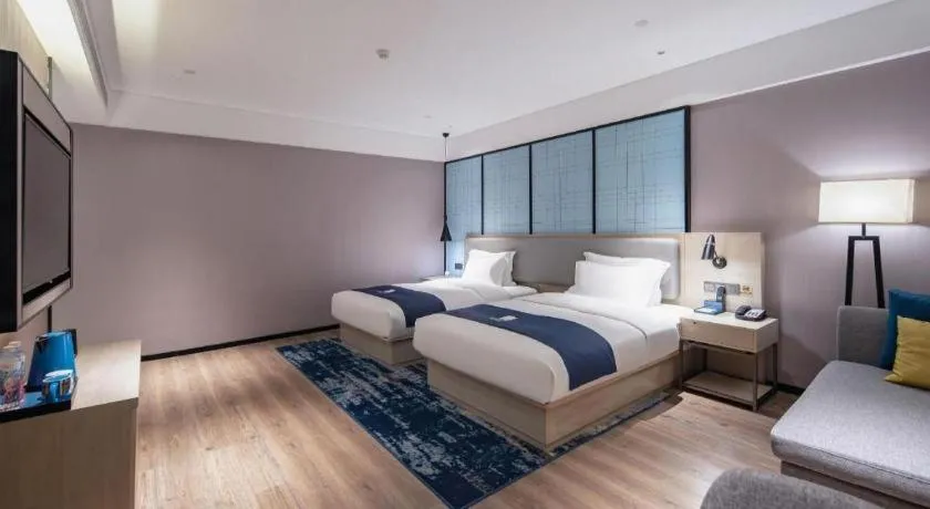 Bed in Echarm Hotel Nanning Wuming