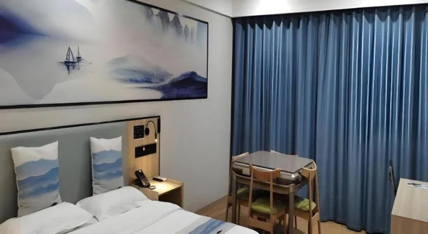 Bed in Green Tree Inn Express Jiangsu Taizhou Xinghua RT-Mart