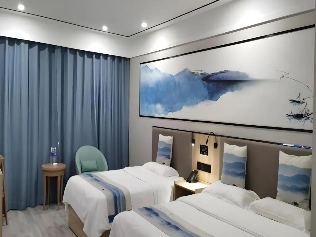 Bed in Green Tree Inn Express Jiangsu Taizhou Xinghua RT-Mart