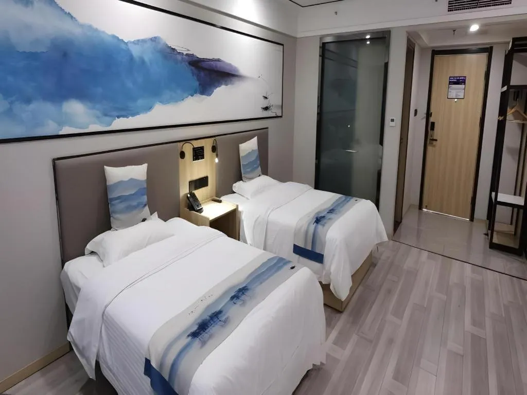 Bed in Green Tree Inn Express Jiangsu Taizhou Xinghua RT-Mart