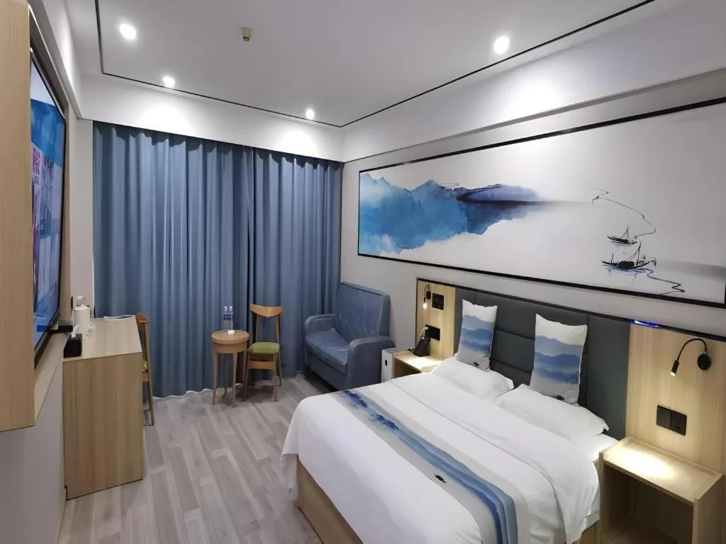 Bed in Green Tree Inn Express Jiangsu Taizhou Xinghua RT-Mart