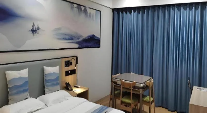 Bed in Green Tree Inn Express Jiangsu Taizhou Xinghua RT-Mart