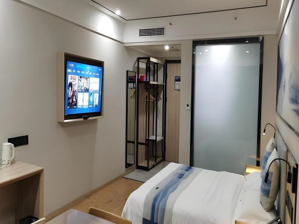 Bed in Green Tree Inn Express Jiangsu Taizhou Xinghua RT-Mart
