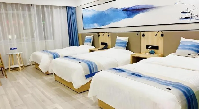 Bed in Green Tree Inn Express Jiangsu Taizhou Xinghua RT-Mart
