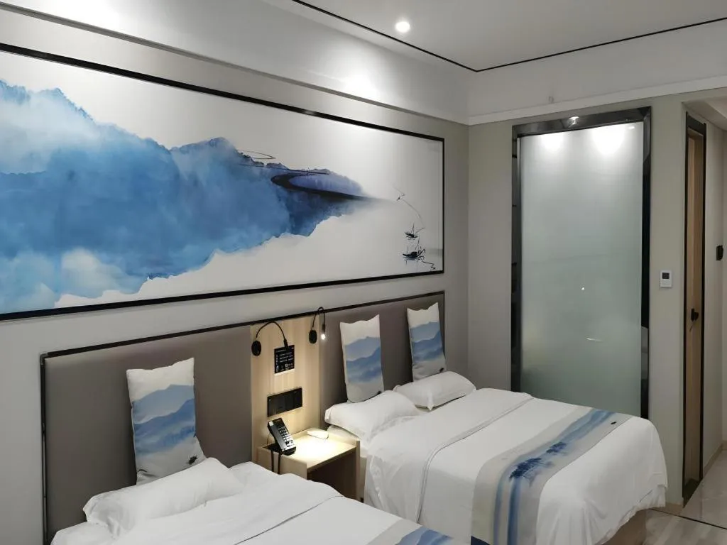 Bed in Green Tree Inn Express Jiangsu Taizhou Xinghua RT-Mart