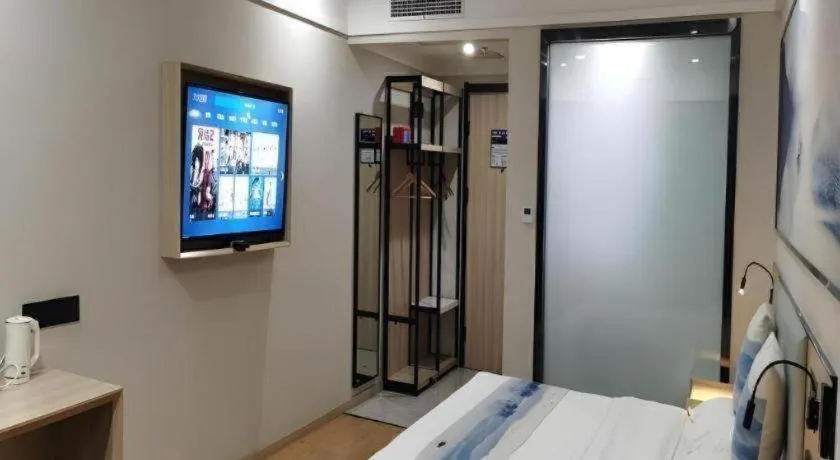 Bed in Green Tree Inn Express Jiangsu Taizhou Xinghua RT-Mart