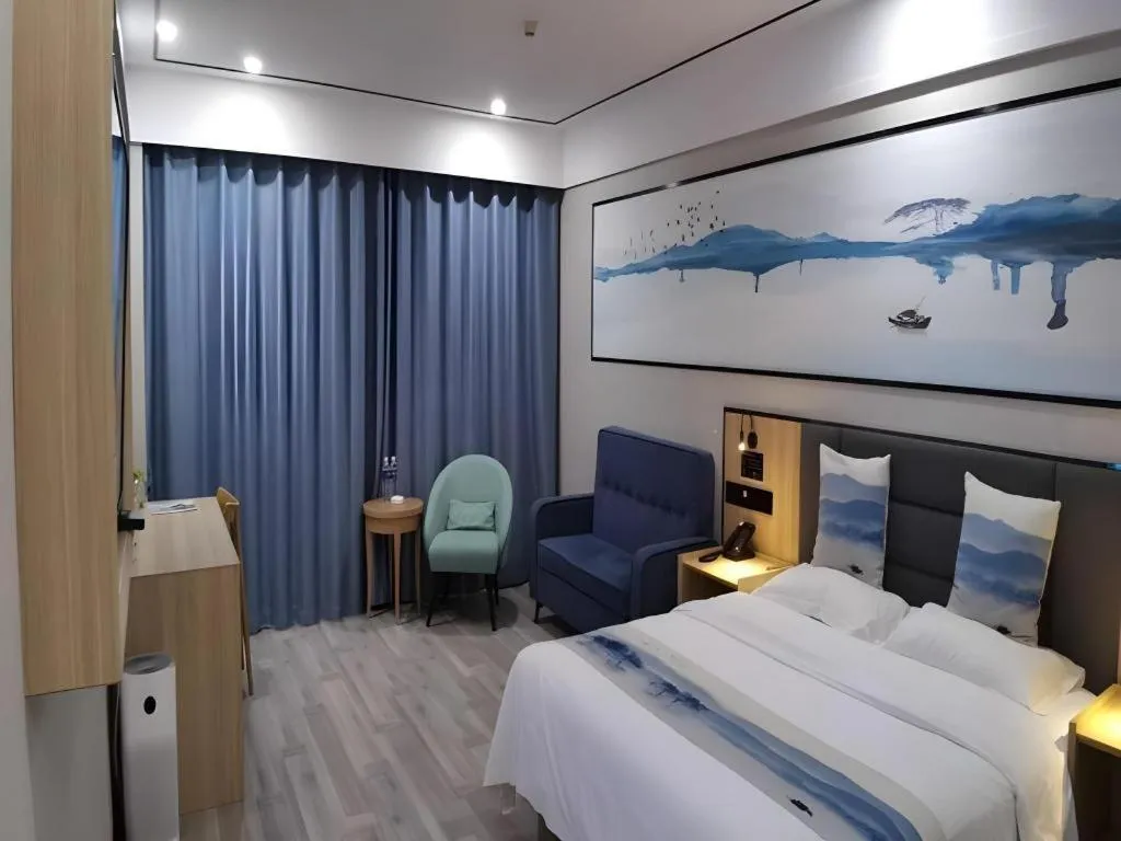Bed in Green Tree Inn Express Jiangsu Taizhou Xinghua RT-Mart