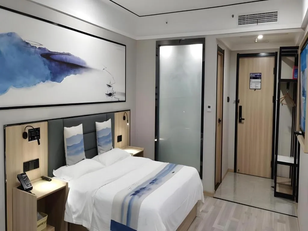 Bed in Green Tree Inn Express Jiangsu Taizhou Xinghua RT-Mart