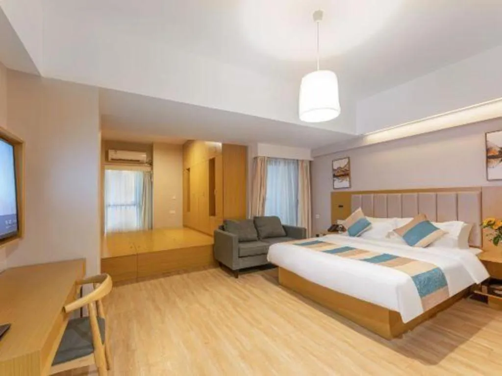 Bed in VX Hotel Wuxi Xinwu District Executive Center Wanda Plaza