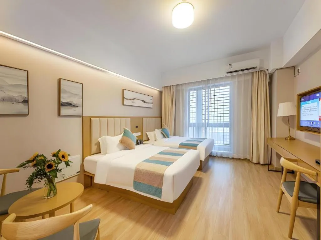 Bed in VX Hotel Wuxi Xinwu District Executive Center Wanda Plaza