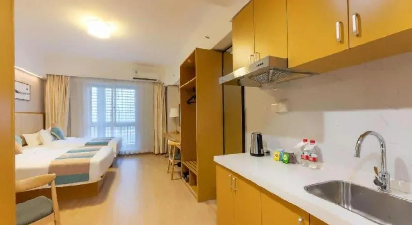 Bed in VX Hotel Wuxi Xinwu District Executive Center Wanda Plaza