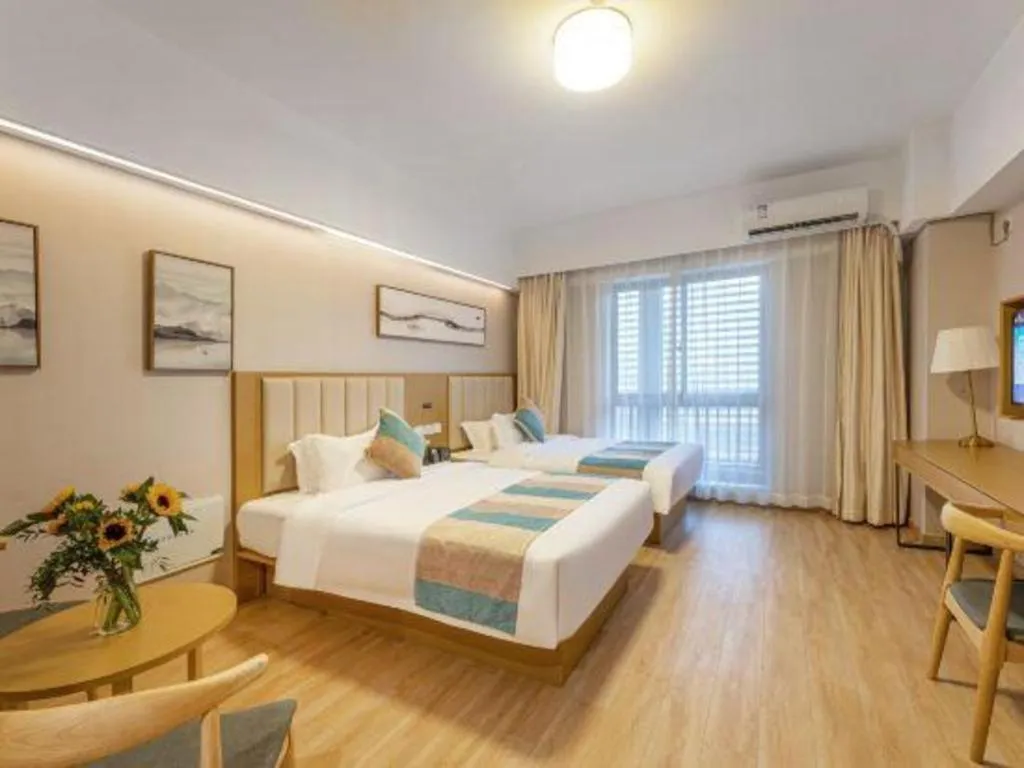 Bed in VX Hotel Wuxi Xinwu District Executive Center Wanda Plaza
