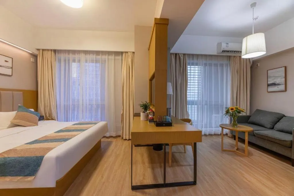 Bed in VX Hotel Wuxi Xinwu District Executive Center Wanda Plaza