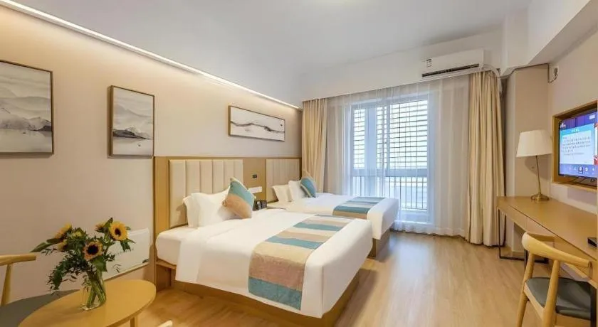 Bed in VX Hotel Wuxi Xinwu District Executive Center Wanda Plaza