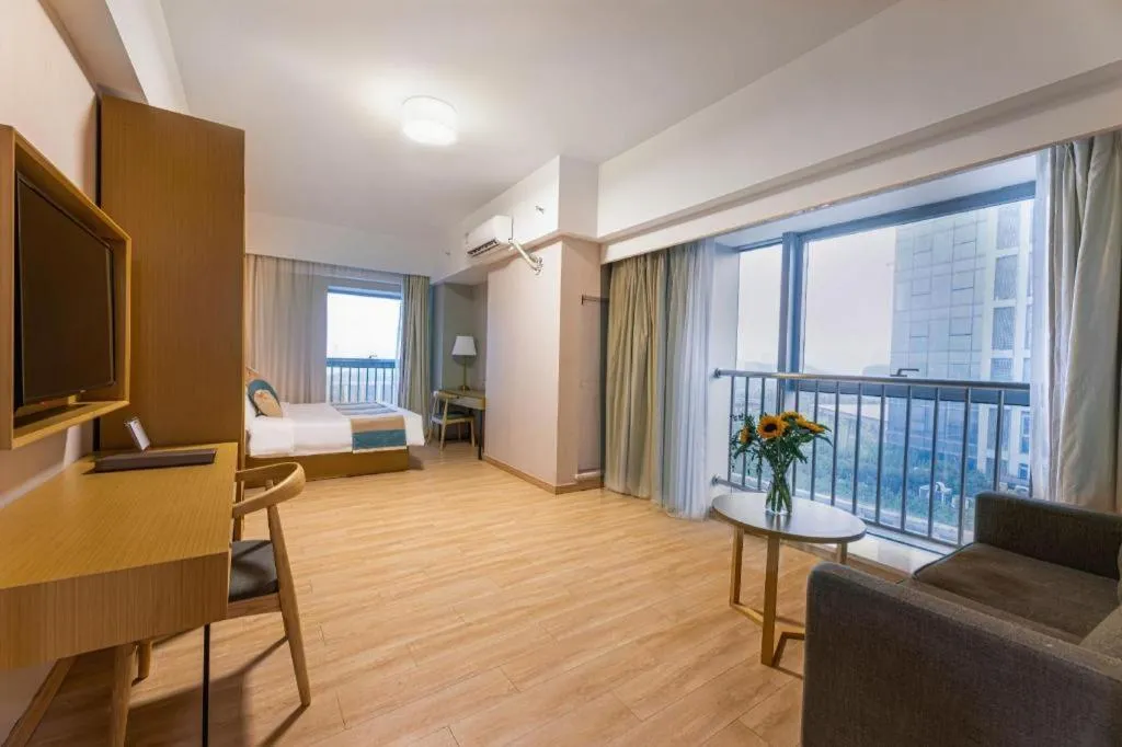 Bed in VX Hotel Wuxi Xinwu District Executive Center Wanda Plaza