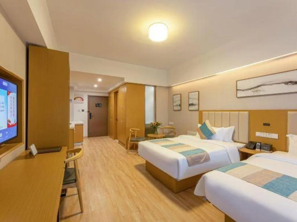 Bed in VX Hotel Wuxi Xinwu District Executive Center Wanda Plaza