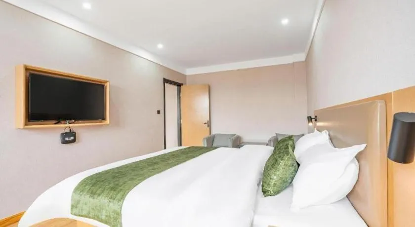 Bed in Green Tree Inn Express Weifang Zhucheng Longyuan Shangcheng