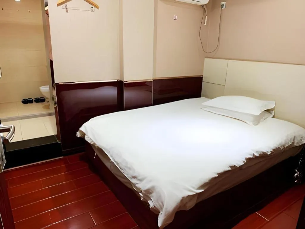 Bed in Shell Hotel Nanjing Mingfa Square Metro Station