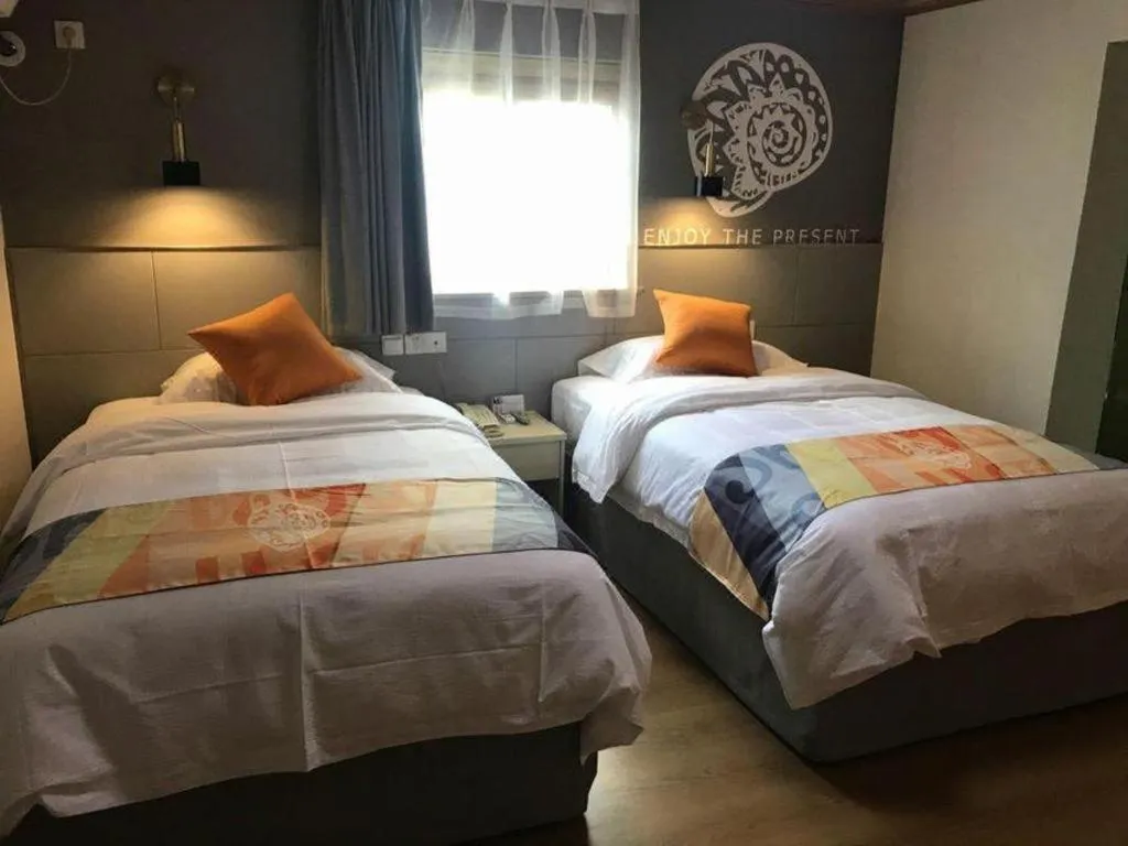 Bed in Shell Hotel Shanghai Minhang District Wenjing Road Metro Station