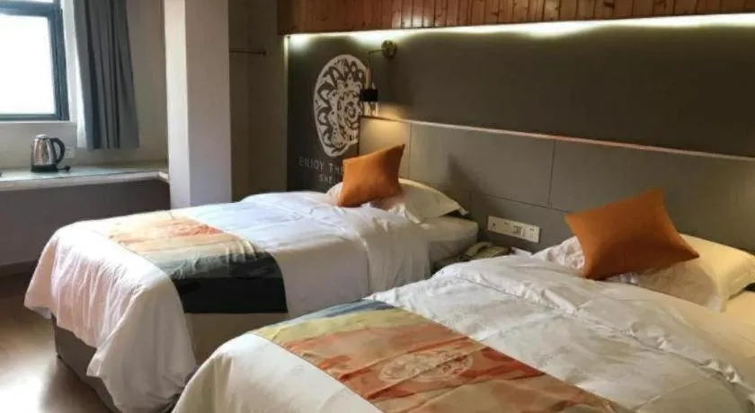 Bed in Shell Hotel Shanghai Minhang District Wenjing Road Metro Station