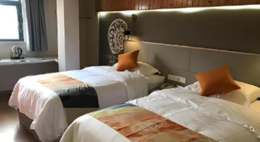 Bed in Shell Hotel Shanghai Minhang District Wenjing Road Metro Station