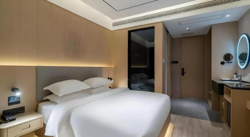 Bed in Deep Sleep Hotel Xuzhou High-Speed Railway Station East Square Oubeisha