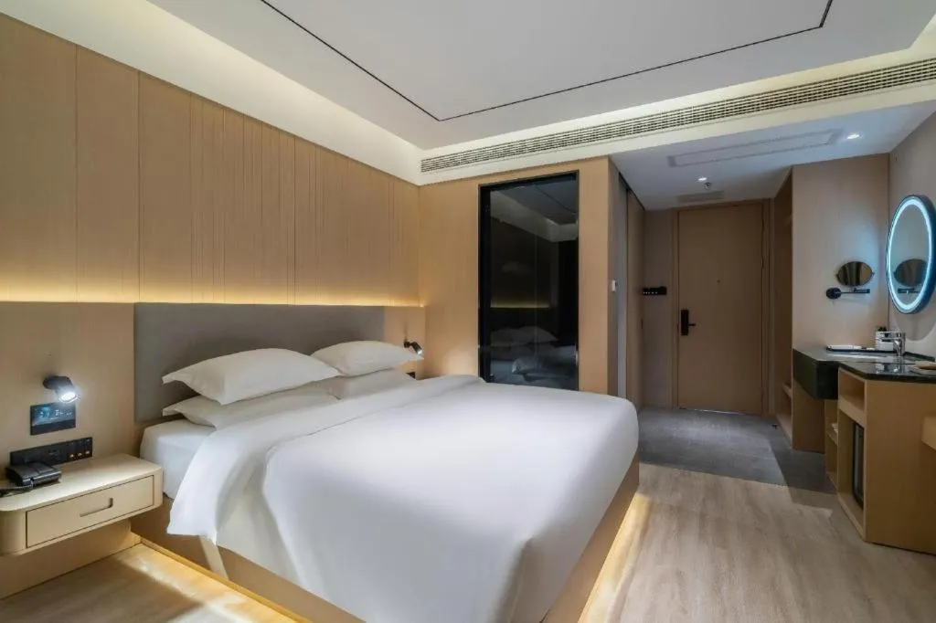 Bed in Deep Sleep Hotel Xuzhou High-Speed Railway Station East Square Oubeisha