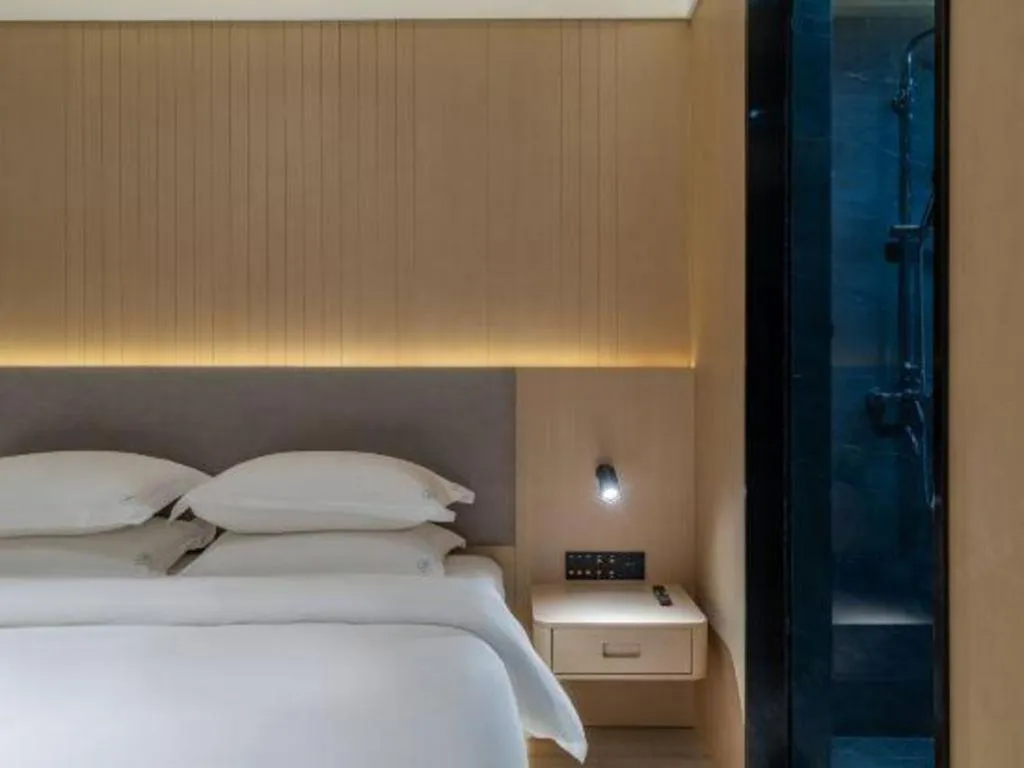 Bed in Deep Sleep Hotel Xuzhou High-Speed Railway Station East Square Oubeisha