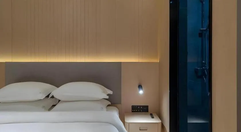 Bed in Deep Sleep Hotel Xuzhou High-Speed Railway Station East Square Oubeisha
