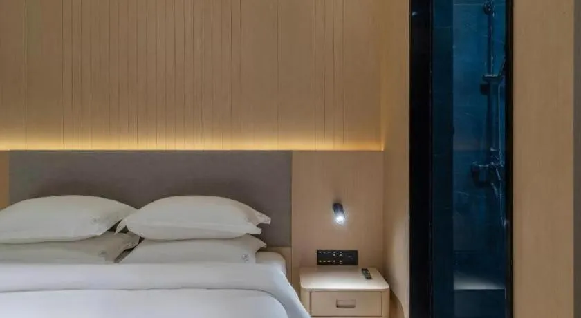 Bed in Deep Sleep Hotel Xuzhou High-Speed Railway Station East Square Oubeisha