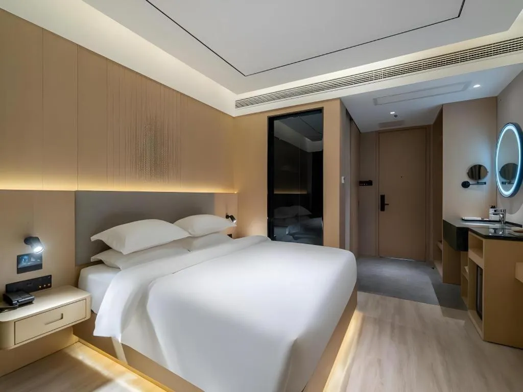 Bed in Deep Sleep Hotel Xuzhou High-Speed Railway Station East Square Oubeisha