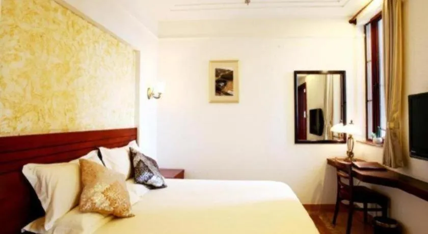 Bed in GreenTree Alliance Hotel Shanghai Baoshan District Meilan Lake Yueluo Road