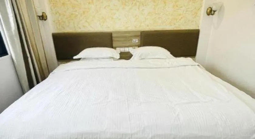 Bed in GreenTree Alliance Hotel Shanghai Baoshan District Meilan Lake Yueluo Road