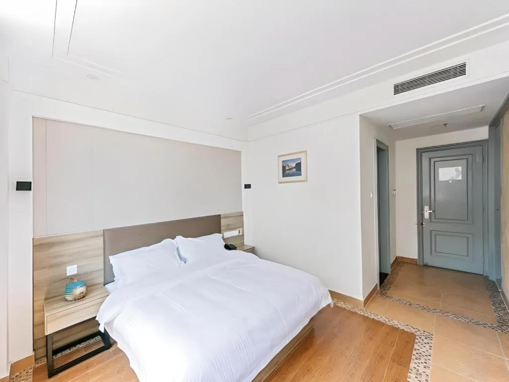 Bed in GreenTree Alliance Hotel Shanghai Baoshan District Meilan Lake Yueluo Road