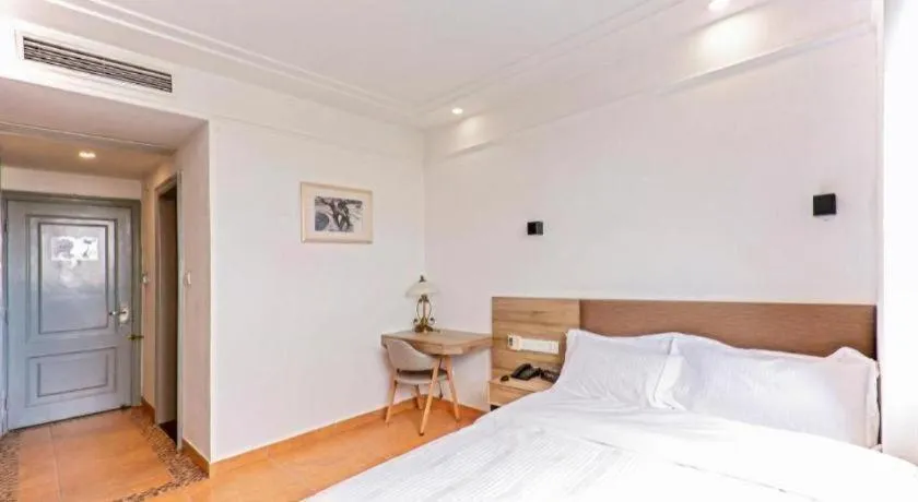 Bed in GreenTree Alliance Hotel Shanghai Baoshan District Meilan Lake Yueluo Road