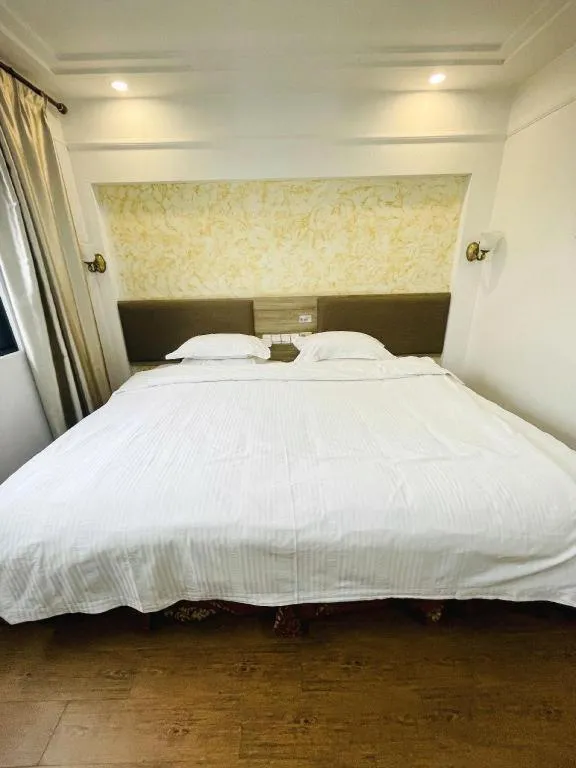 Bed in GreenTree Alliance Hotel Shanghai Baoshan District Meilan Lake Yueluo Road