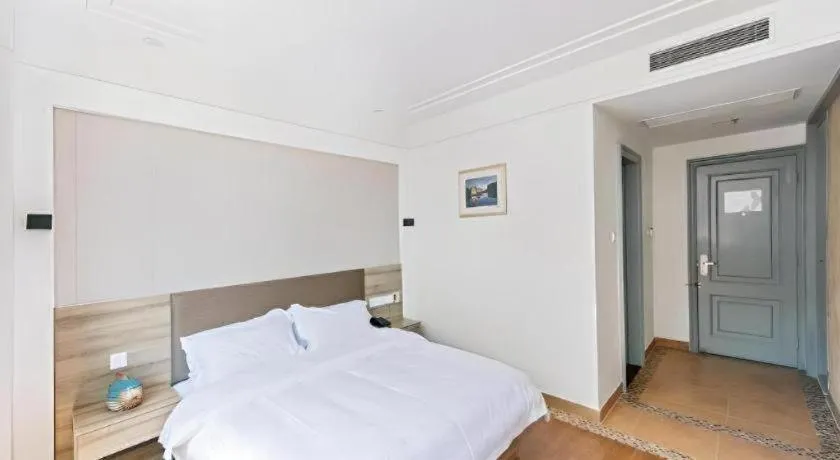 Bed in GreenTree Alliance Hotel Shanghai Baoshan District Meilan Lake Yueluo Road