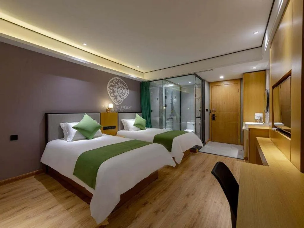 Bed in Shell Hotel Anhui Huaibei Railway Station Huiyuan Road