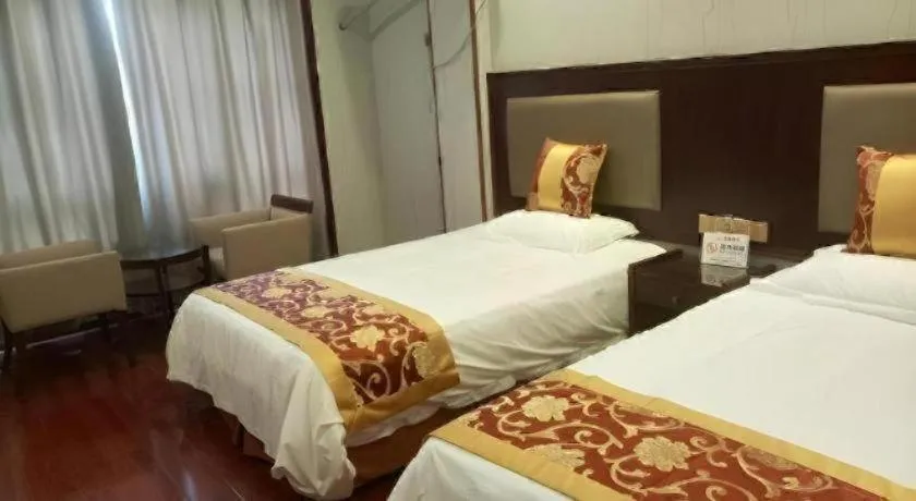 Bed in Shell Hotel Wuxi Jiangyin Zhutang Town