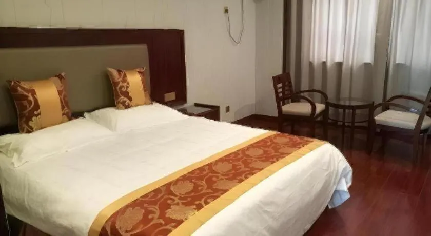 Bed in Shell Hotel Wuxi Jiangyin Zhutang Town