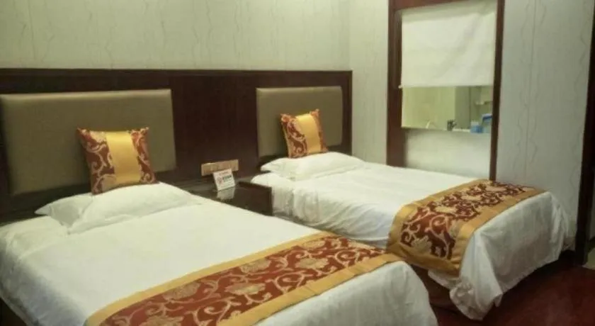 Bed in Shell Hotel Wuxi Jiangyin Zhutang Town